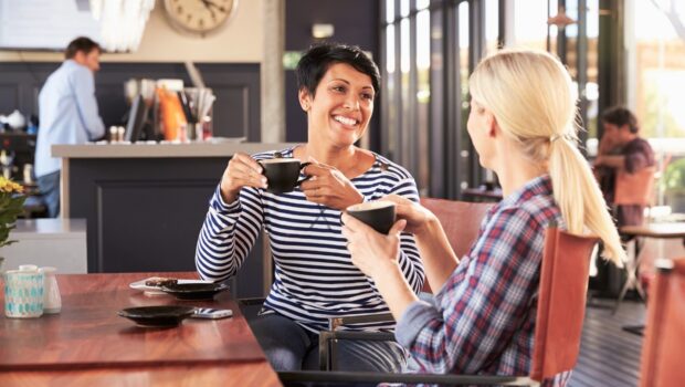 Two women having coffee in a cafe